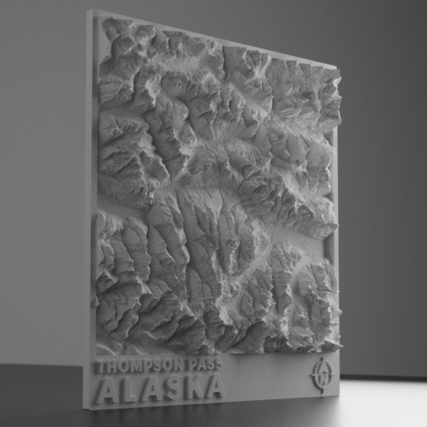 3D terrain model of Thompson Pass, Alaska showing snow-covered mountain ridges, deep valleys, and backcountry terrain shaped by high-resolution elevation data.