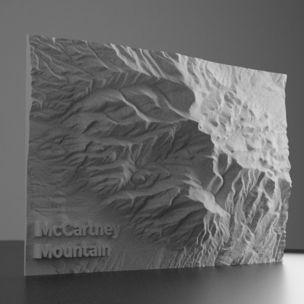 3D terrain rendering of McCartney Mountain, Montana, showing detailed ridgelines, steep slopes, and surrounding foothills based on USGS elevation data.