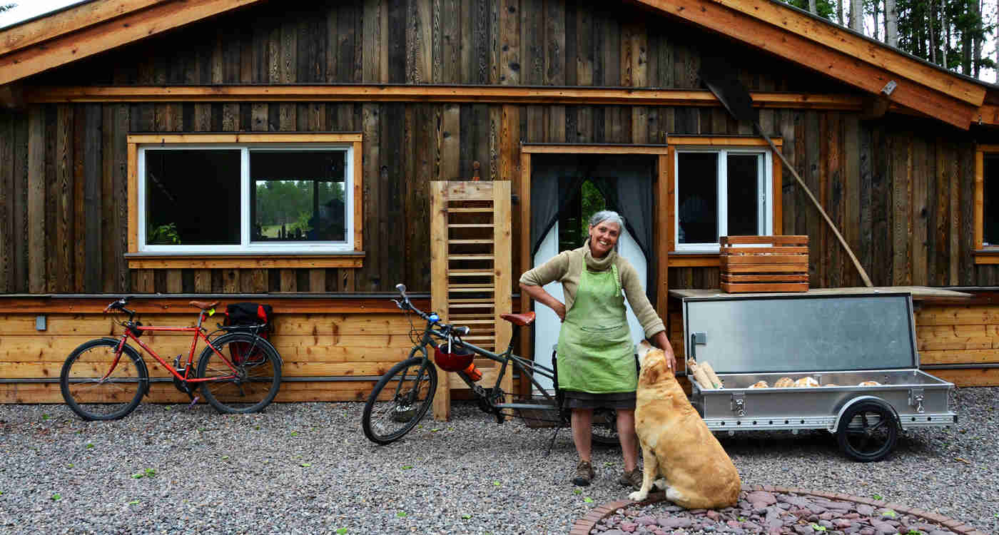 Meg Roberts in front of her stone oven bakery.