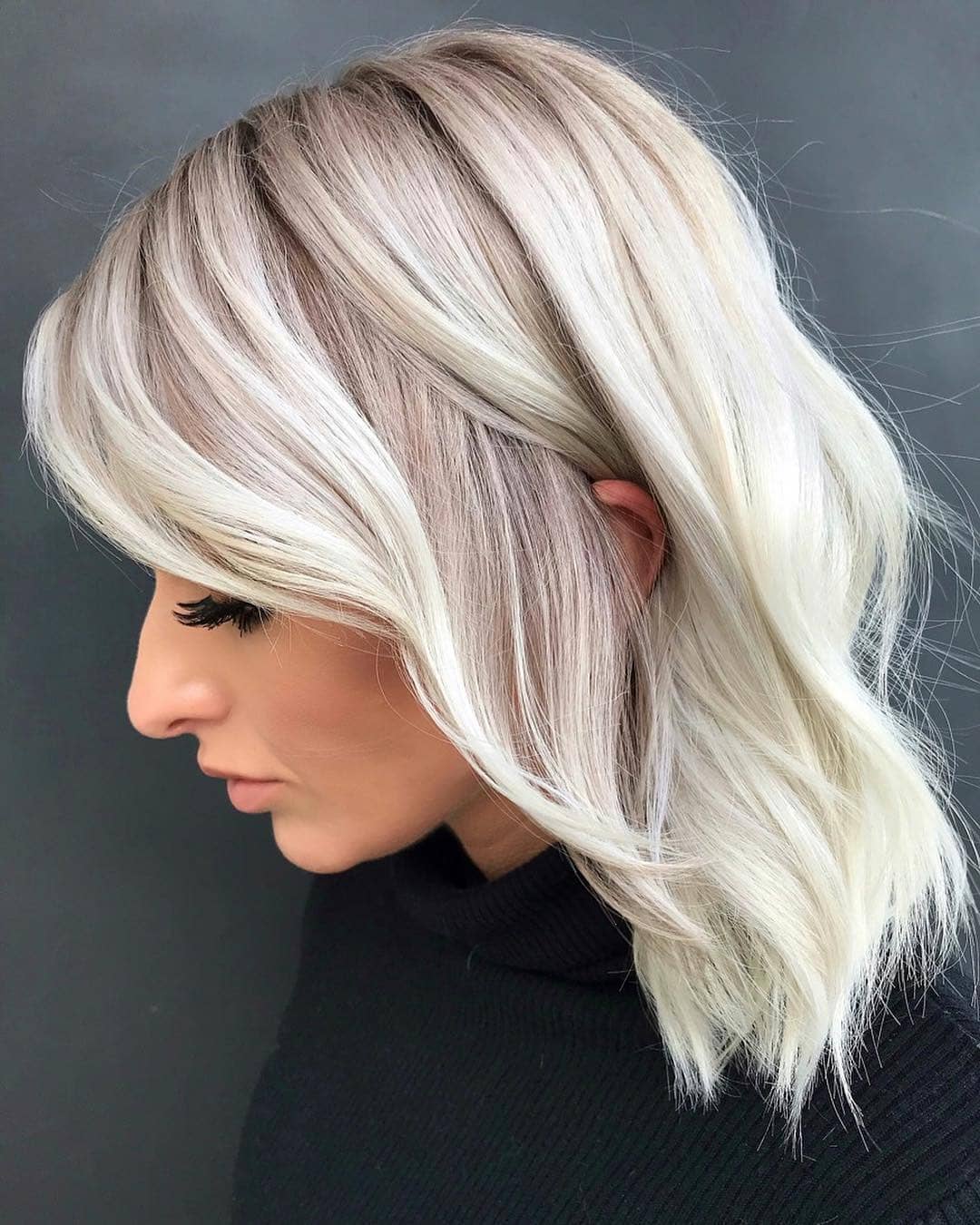 Layered Haircut in Silver Blonde