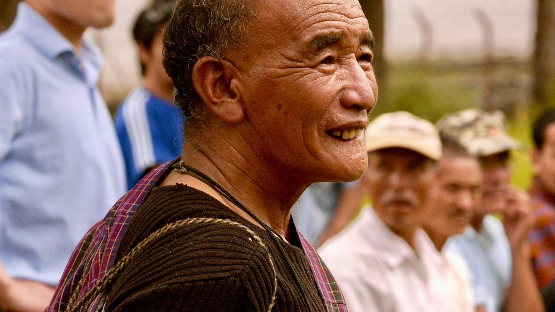 Local audiences as they wait for an archery match.