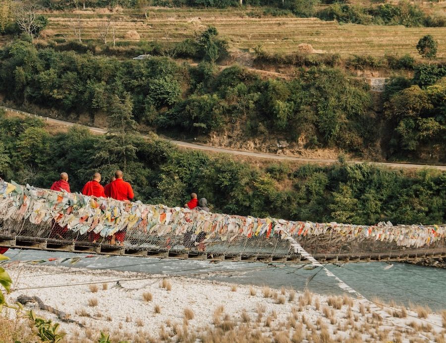 Monks walking on the Trans Bhutan Trail