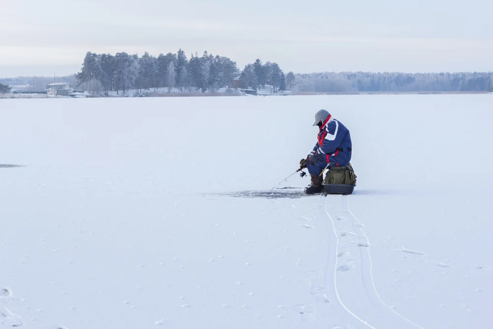 Ice Fishing on a Frozen Lake