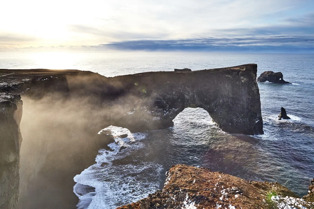  Watch waves crash at Dyrhólaey Arch