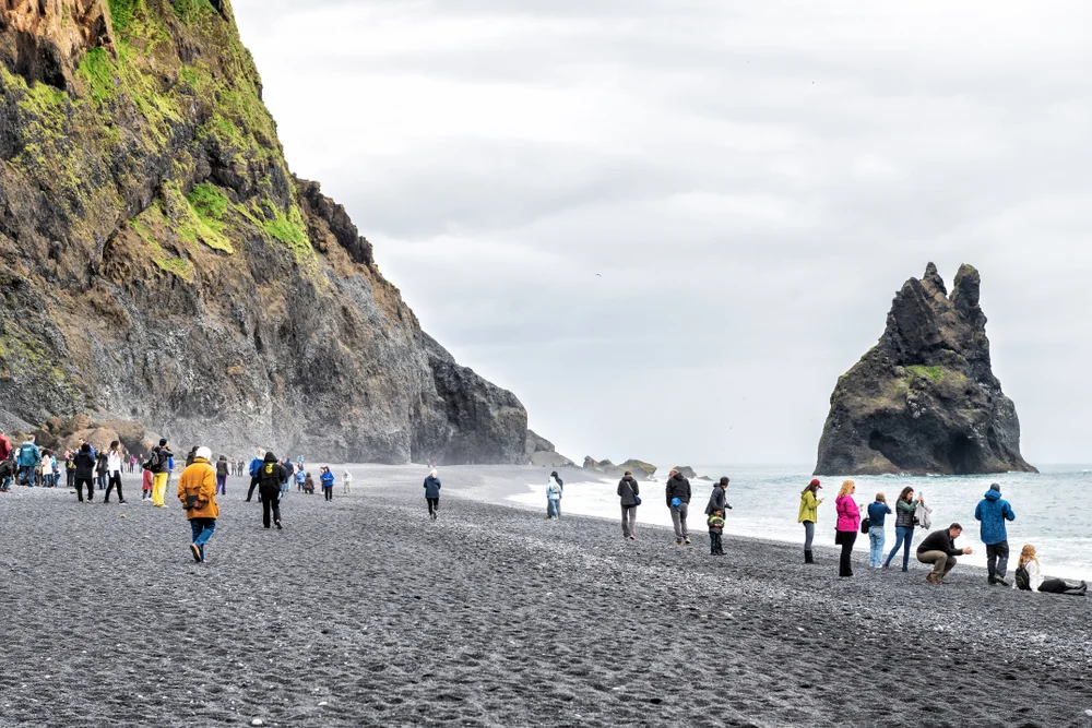 Walk on the black sands of Reynisfjara Beach