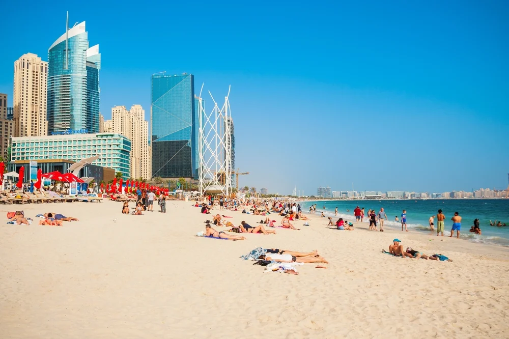 Relax and sunbathe at Jumeirah Beach’s white sands