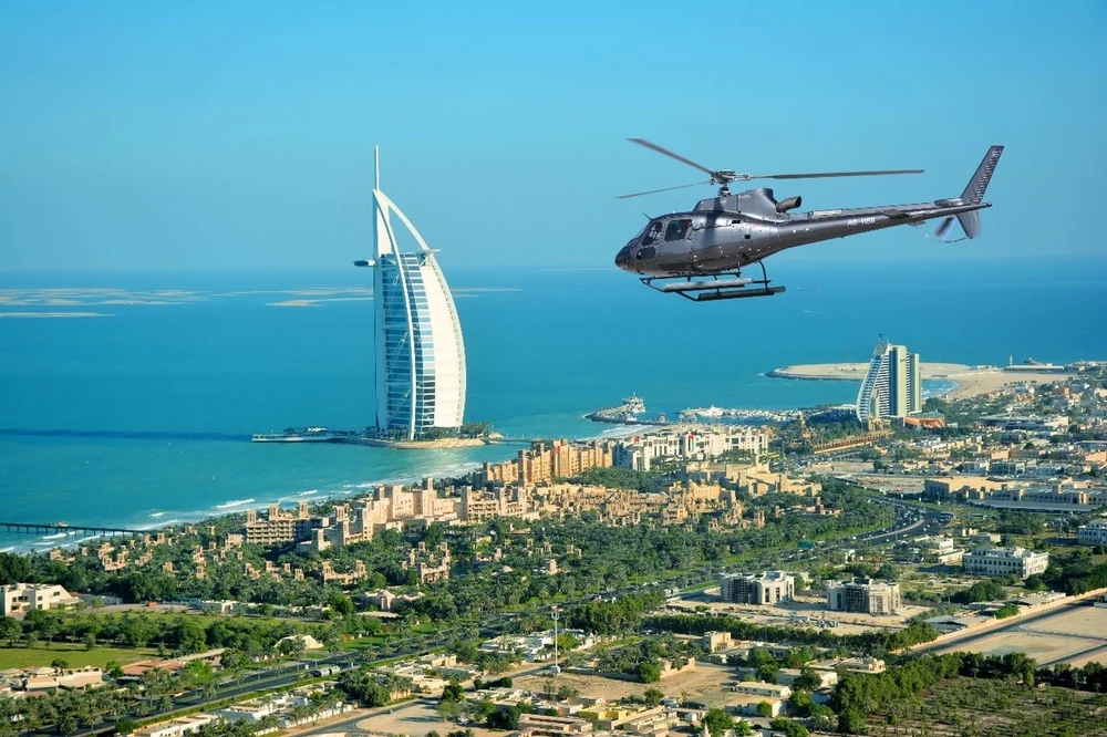 Fly over iconic landmarks on a Helicopter Tour of Dubai