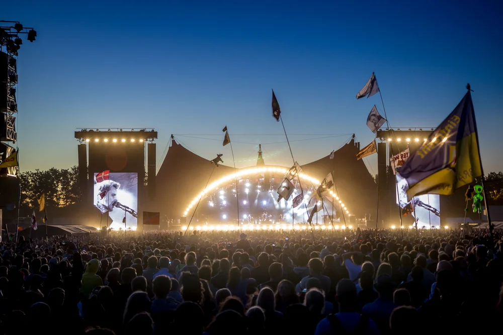Attend the Roskilde Music Festival
