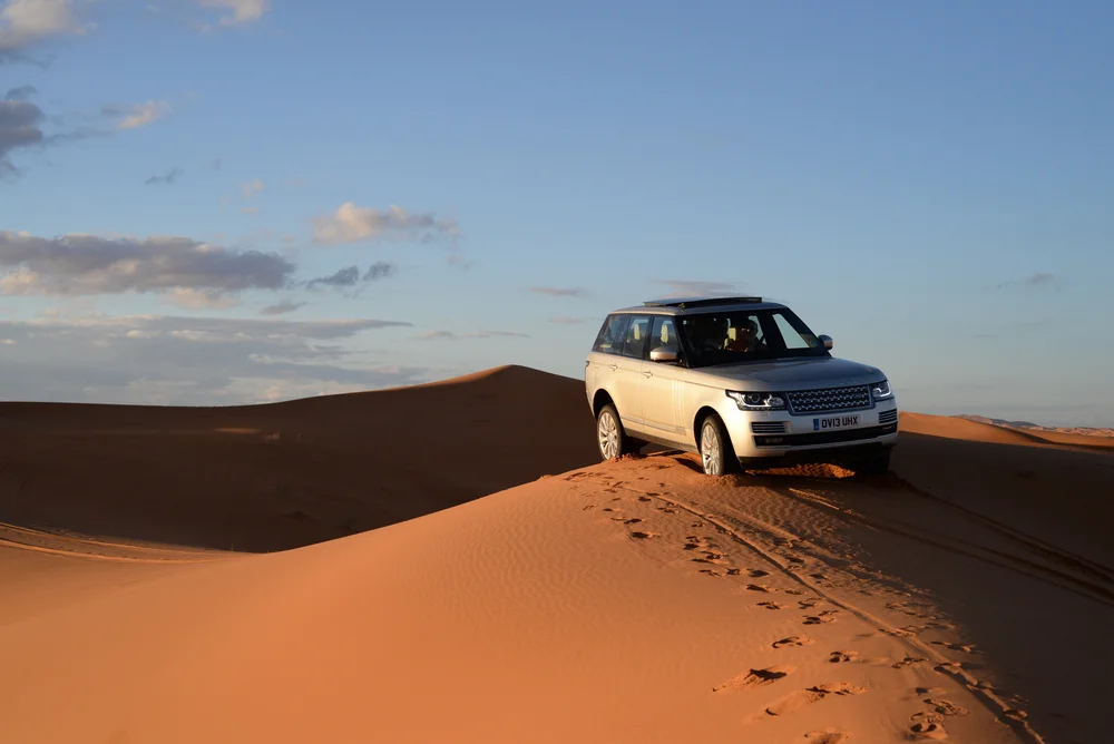 Luxury Desert Safari – Premium camps, gourmet meals, Range Rover rides