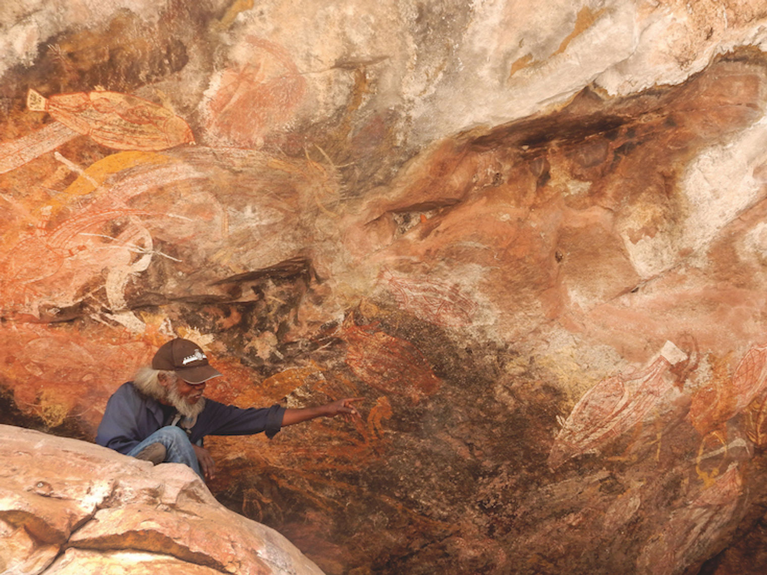 Aboriginal tour guide with rock art
