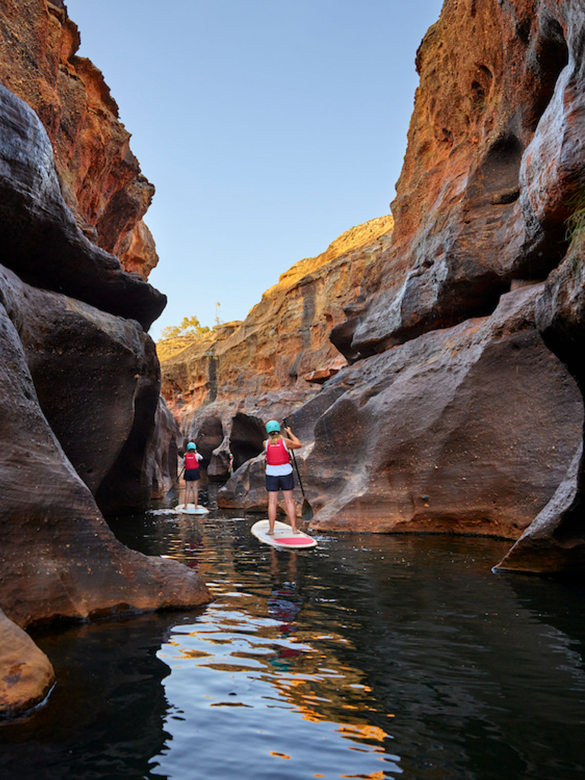 Two people standup paddle boarding in Australia Queensland Cobbold Gorge, SUP Tour in the Tropical North