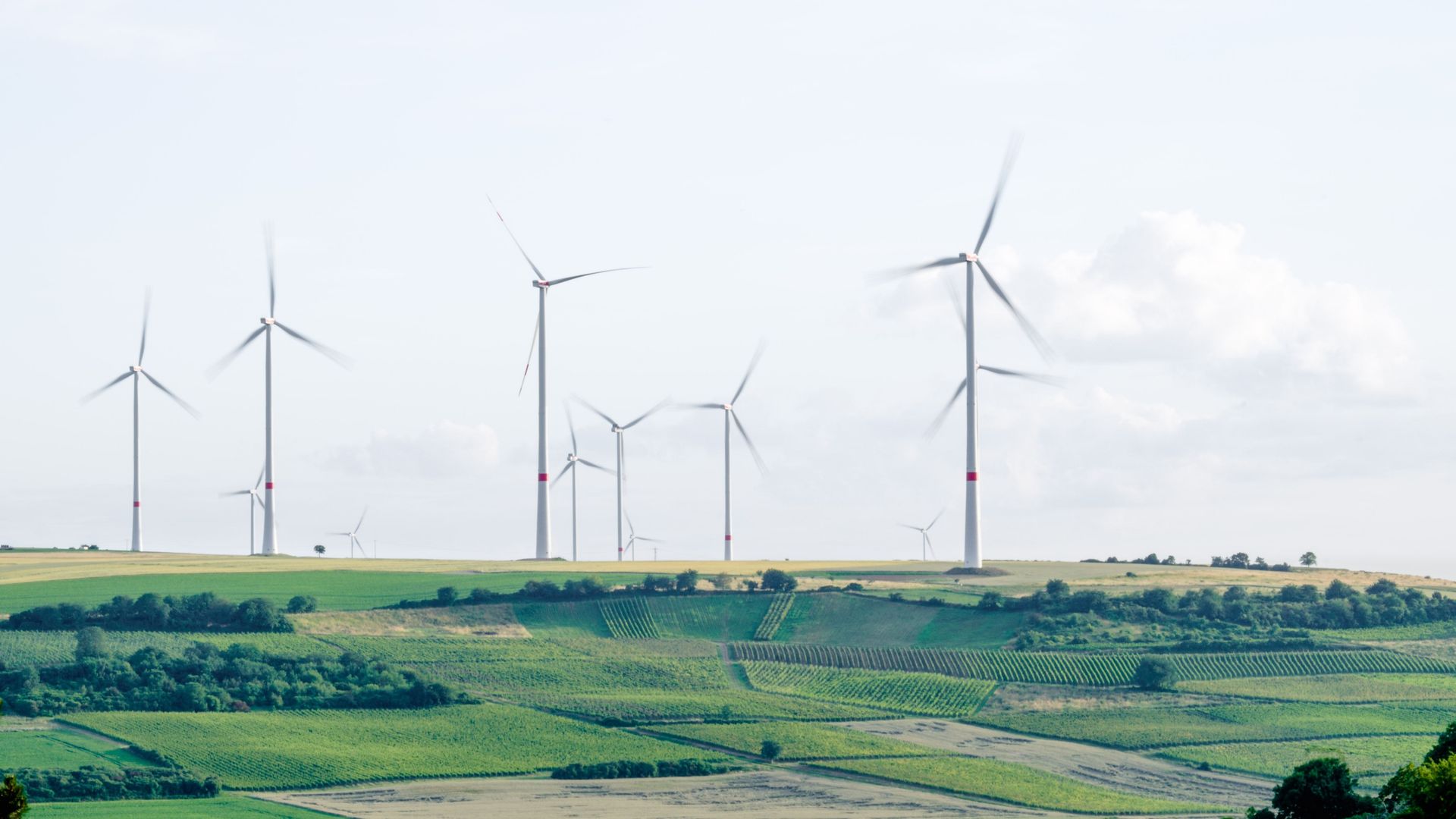 Sustainable travel wind turbine karsten wurth unsplash
