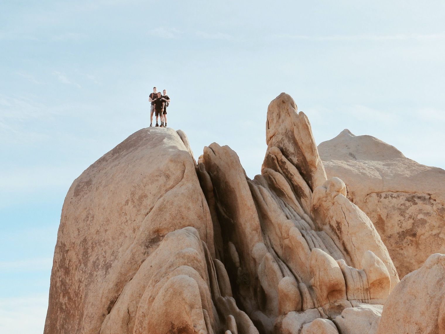 US California Joshua Tree NP visitors rock climbing sam mgrdichian unsplash