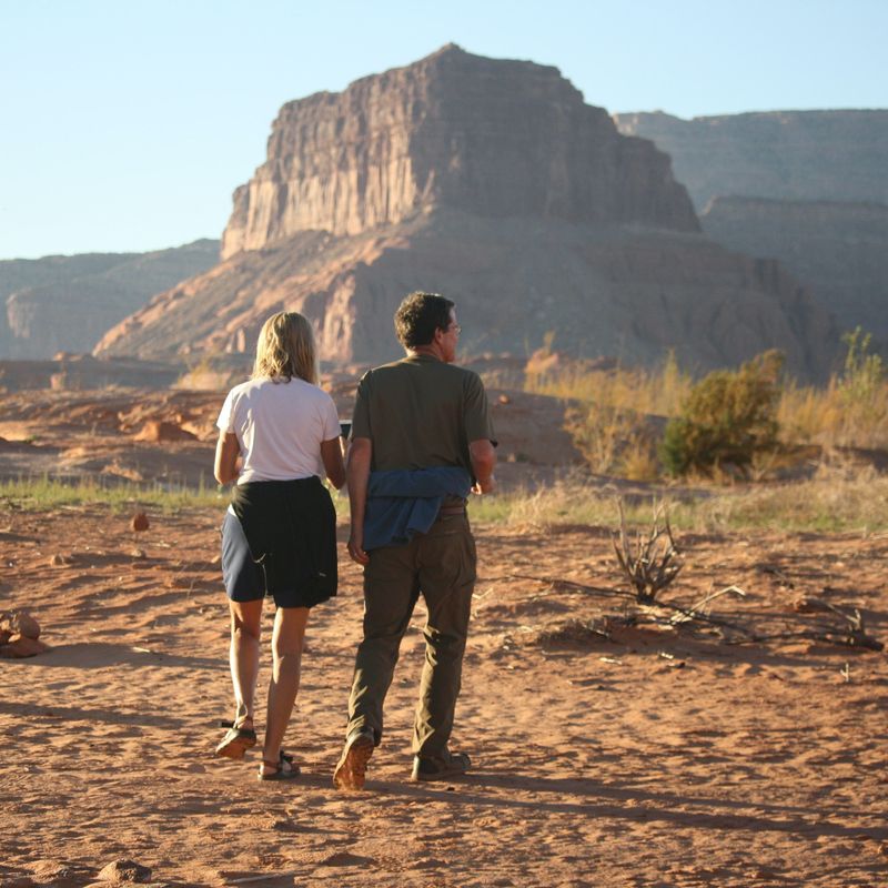 A couple walking along the Lake Powell trail in Arizona, USA