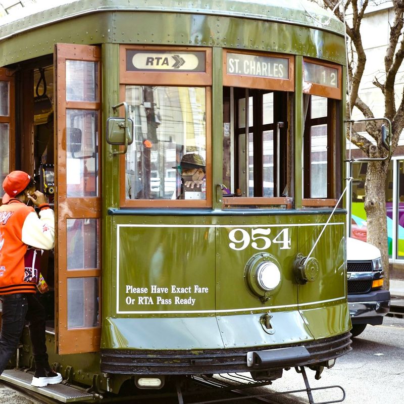 A person boards a tram in New Orleans, Louisiana, USA