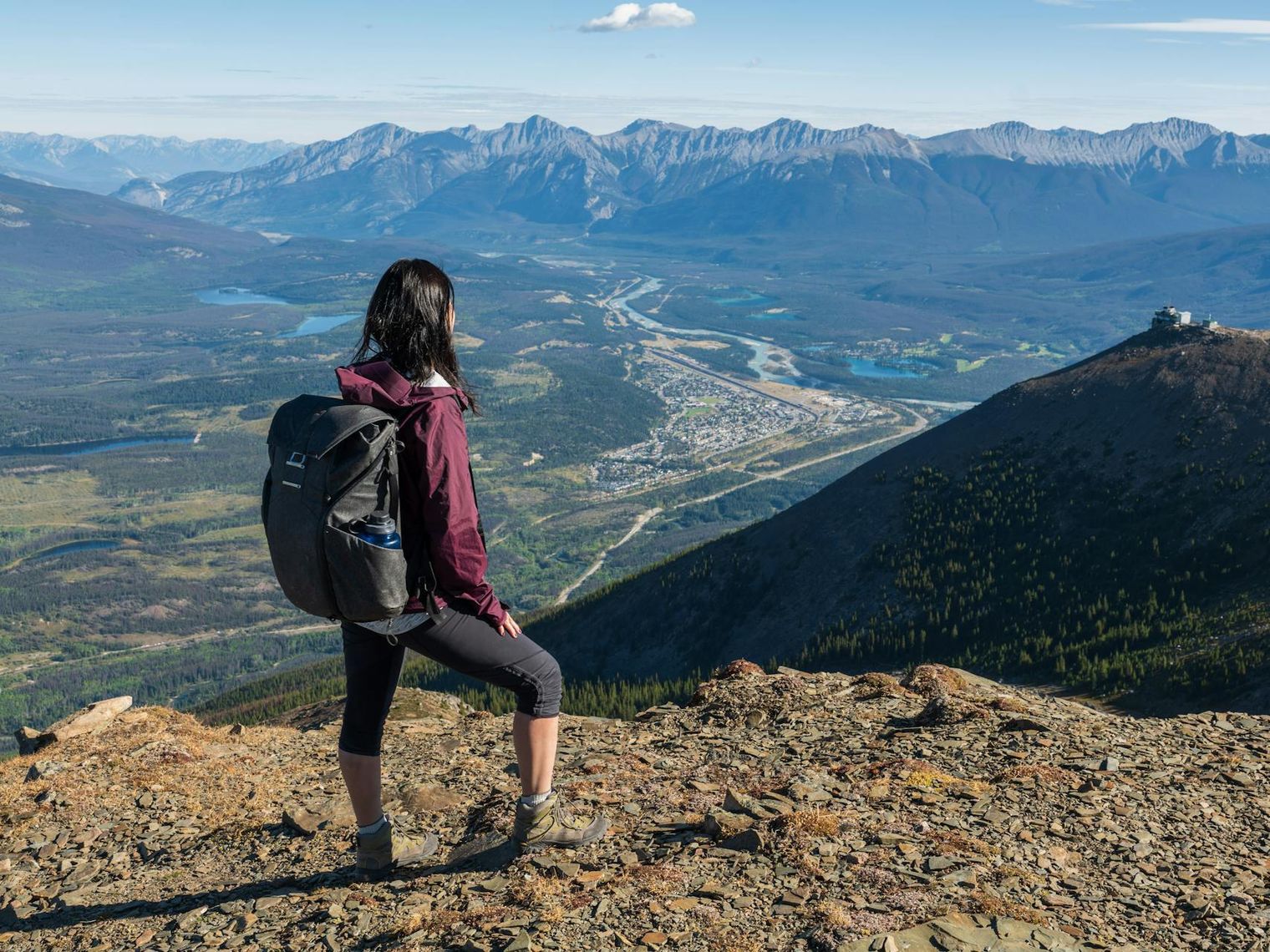 A hiker looking out over the valley in Jasper National Park Canada