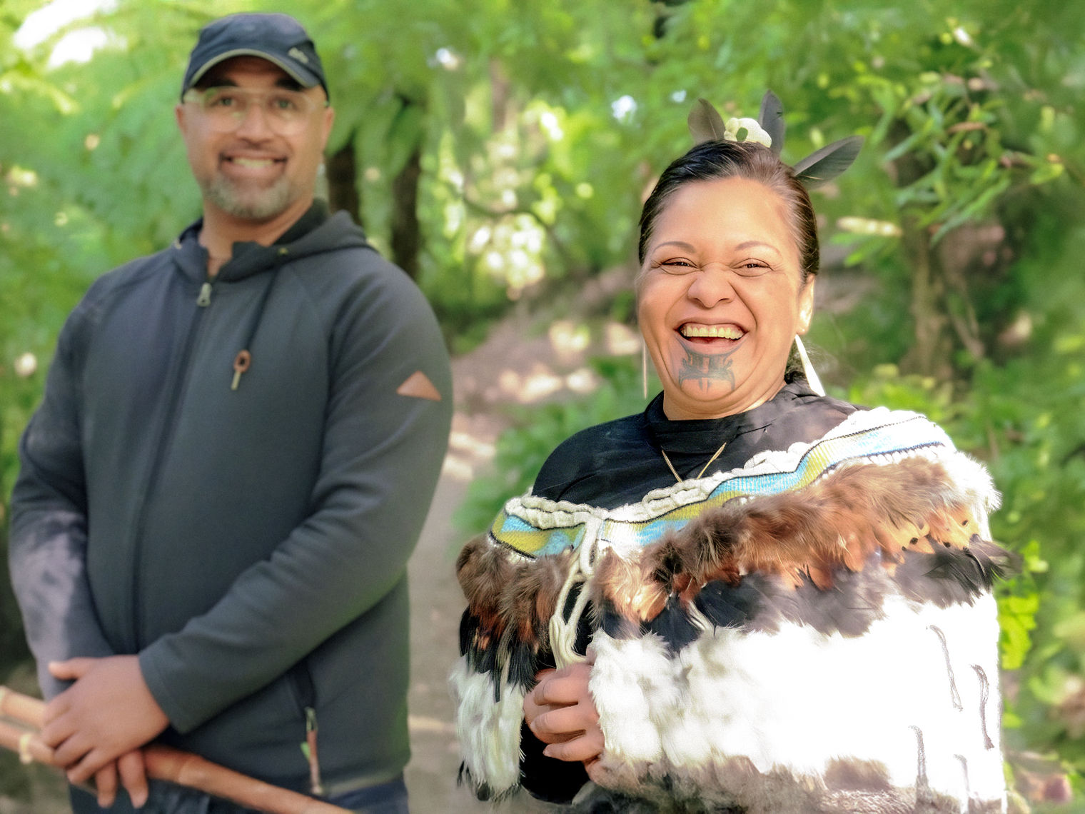 Local hosts smiling at the camera