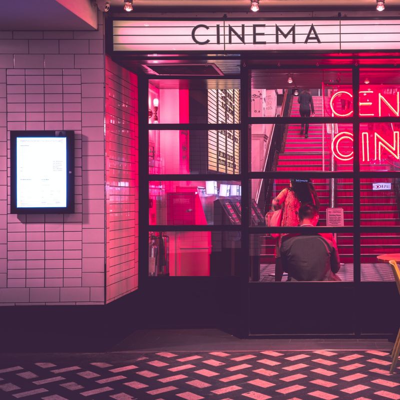Neon lights in cinema foyer