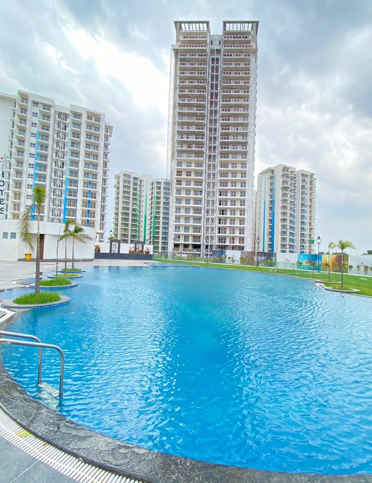 Clubhouse and landscaped greens at Hero Homes