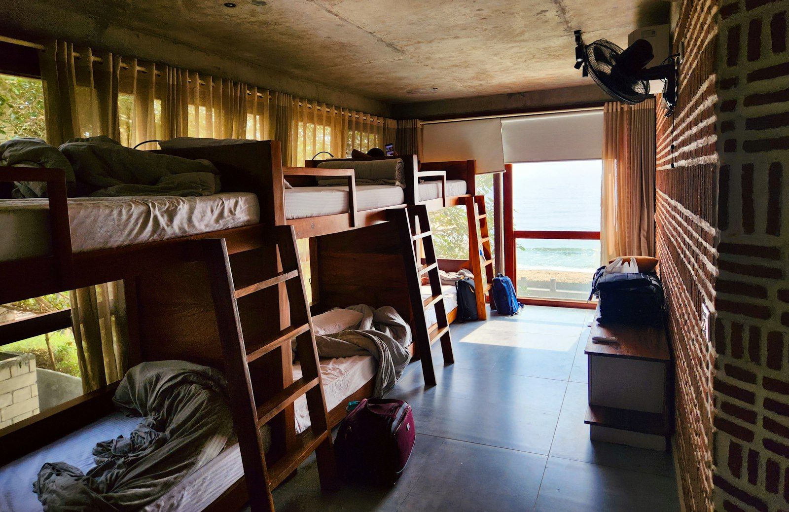 Dorm room — bunk beds and natural light from the window