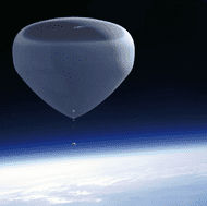 A hot air balloon flying over the earth.