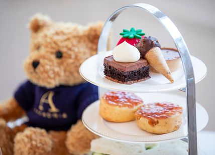 An image of an Afternoon tea with bear. The Adria