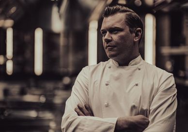 An image of a chef in a kitchen, 7-Course Tasting Menu. Alex Dilling at Hotel Cafe Royal
