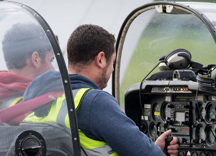 An image of two man. Almat Flying Academy