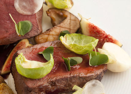 An image of a plate of food with meat, Three-course lunch. Aqua Shard (The Shard)