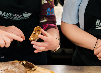 An image of two people preparing food, Private Home Baking Class. Bake With A Legend