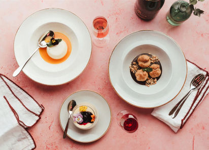 An image of a table setting with plates and uts, Wine and Dine Experience. Balfour Winery