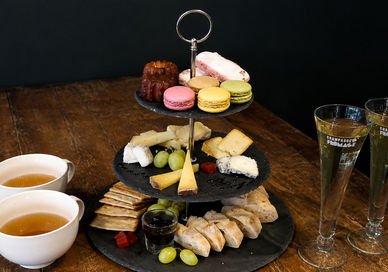 An image of afternoon tea.Champagne + Fromage