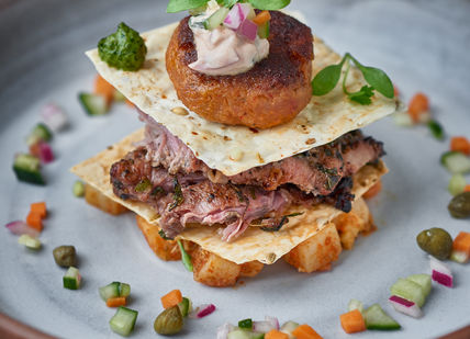 An image of a plate of food on a table, The Iconic Tasting Menu with Wine pairing. The Cinnamon Club