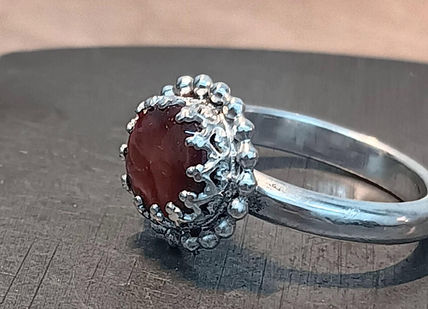 An image of hand made silver rings