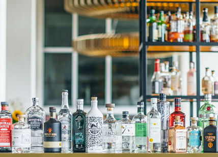 An image of a bar with bottles of alcohol, Gin & Tonic Masterclass With Three-Course Lunch. D&D - Skylon