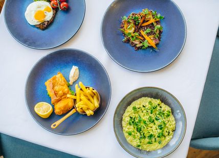 An image of a table with plates of food, Gin & Tonic Masterclass With Three-Course Lunch. D&D - Skylon