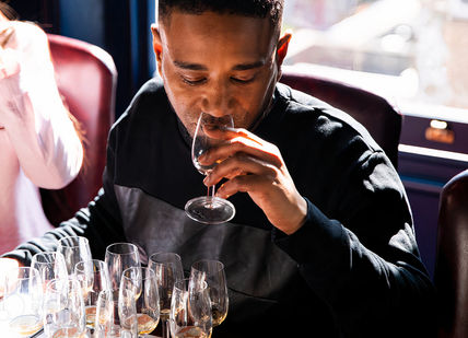 An image of a man eating a meal, The Whisky Thing Experience. The Distillery