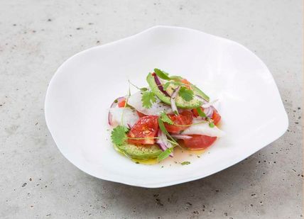 An image of a plate of food on a table, Six-Course Tasting Menu. Elystan Street