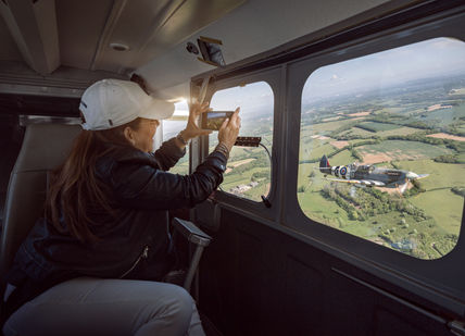 An image of people looking form the plane