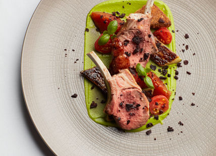 An image of a plate of food on a table, Menu Gourmand. Galvin