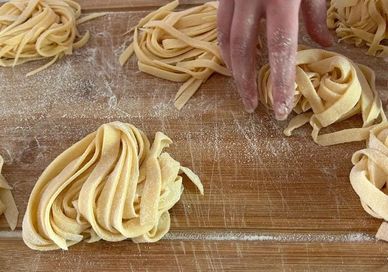 An image of person making pasta