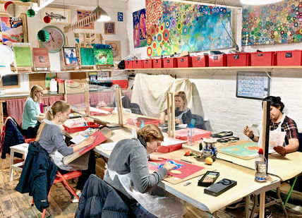 An image of group of people in a masteclass