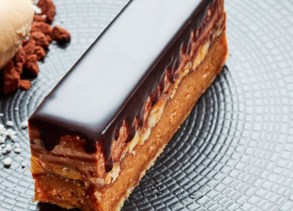 An image of a piece of chocolate cake, Three Courses and Free-Flowing Prosecco at M Threadneedle. M Threadneedle