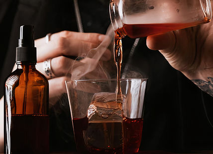 An image of someone pouring a drink into a glass, Japanese Whisky Masterclass. Map Maison