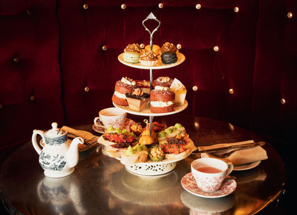 An image of a table with a cake stand, Map Maison Tapas-Style Afternoon Tea. Map Maison