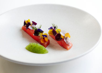 An image of a plate of food with vegetables, 5 course menu. Marcus