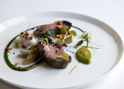 An image of a plate of food on a table, Chef’s Table Experience at Michelin-Starred Marcus Wareing's restaurant. Marcus