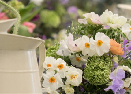 An image of flowers in vases on a table, One-Day Flower Masterclass. McQueens