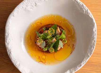 An image of a plate of food on a table, Four-Course Lunch. Mere Restaurant