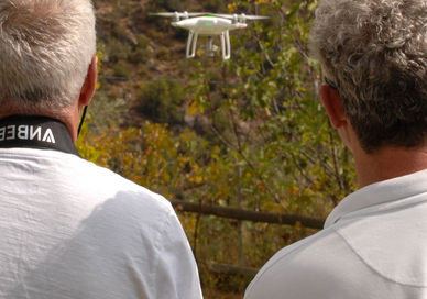 An image of two men flying a drone, Private One Hour Drone Lesson. PhantomFlightSchool